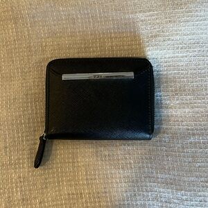 Black TUMI wallet